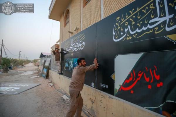 العتبة العلوية تباشر بنشر اللافتات الخاصة بذكرى أربعينية الإمام الحسين (ع)