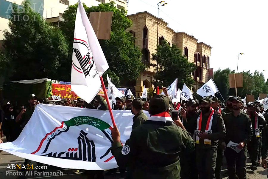 تقرير مصور/ موكب الحشد الشعبي العراقي في أربعينية الامام الحسين (ع) 