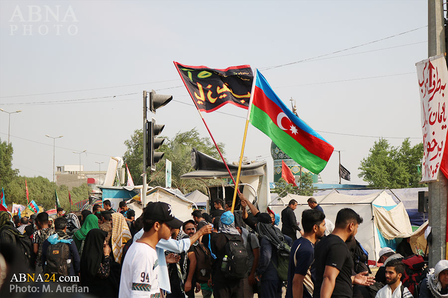 Photos: Flags of different countries among Imam Hussain's banners during Arbaeen pilgrimage