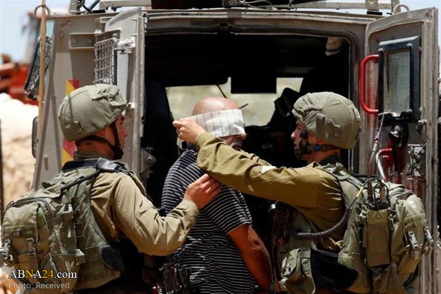 Israeli forces detain 14 Palestinians in West Bank raids