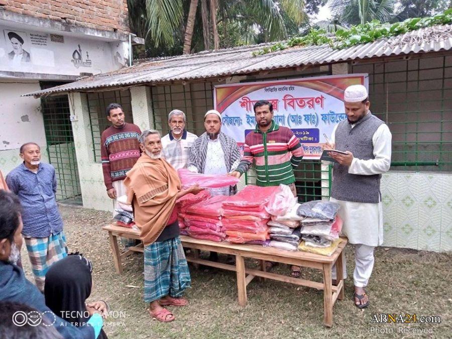 Photos: Shiites distribute warm clothes to needy people in Bangladesh