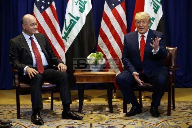 ترامب يعتزم التحدث مع صالح حول سحب قواته من العراق في دافوس