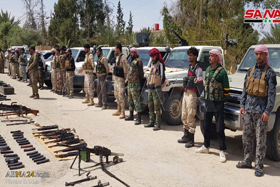 Militant groups working for US hands over its weapons to Syrian Army (+Photos)