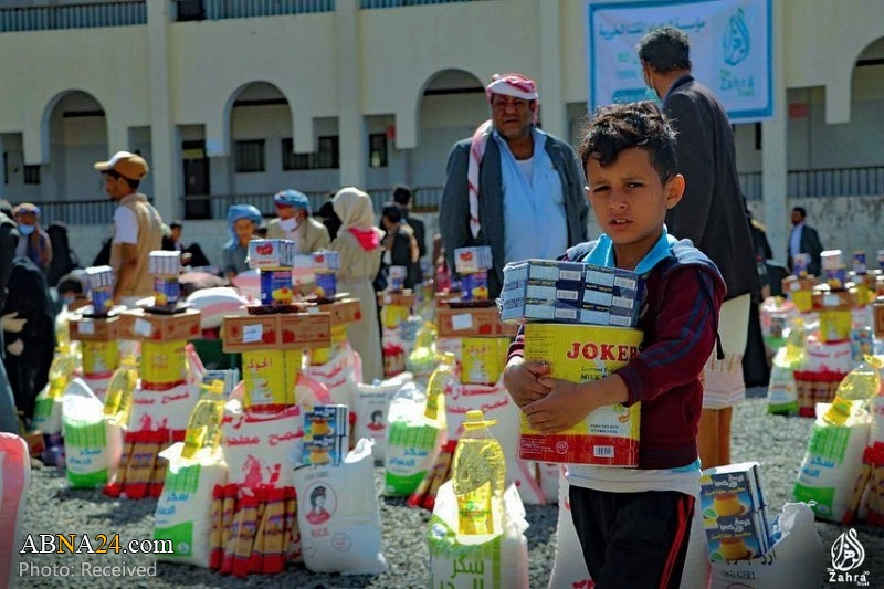 Photos: "Al-Zahra" charity organization distributes food aid among needy people