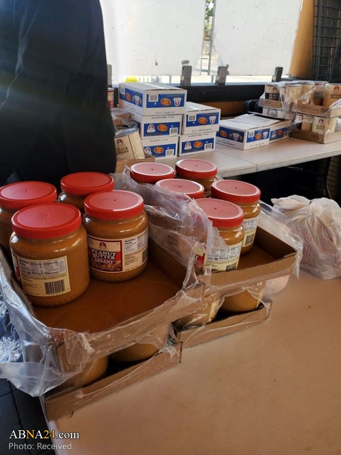 تقرير مصور / توزيع سلات غذائية للعوائل المحتاجة في لوس أنجلوس الامريكية