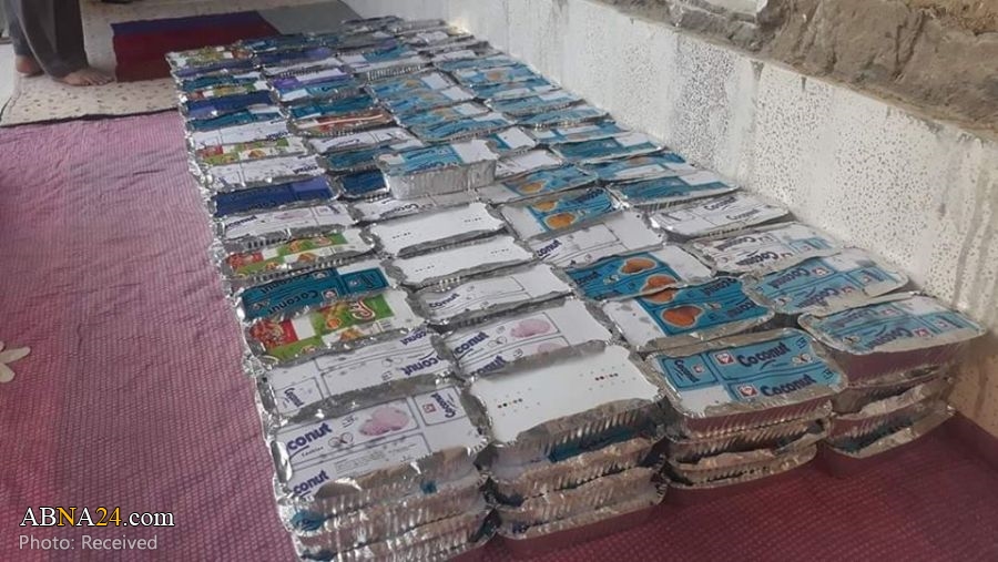 تقرير مصور / شيعة كويتا الباكستانية يوزعون افطارية رمضانية