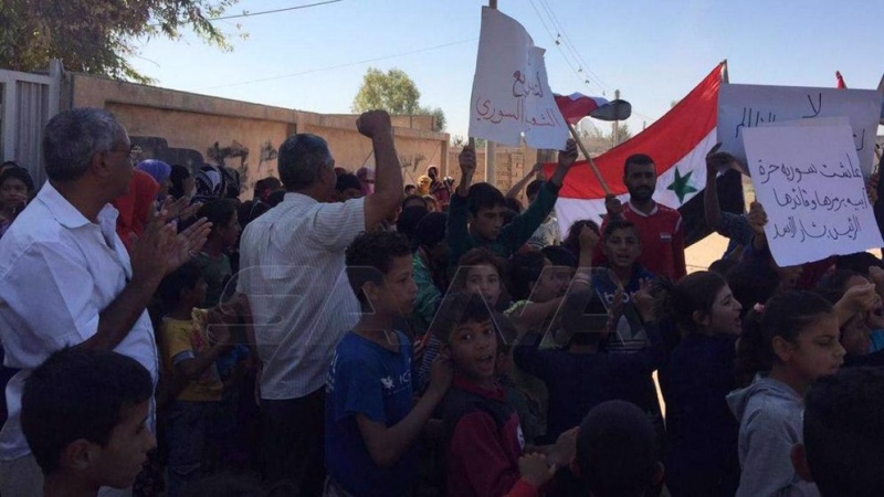 Residents in northern Hasakah province stage protest against US, Turkish occupation of Syria