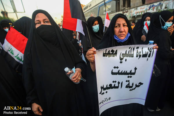 تقرير مصور / تظاهرات في بغداد تنديدا بإساءة صحيفة "شارلي ابدو" بحق النبي (ض)