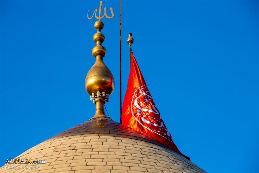 To mark the start of Rabi` al-Awal: Red flag fluttered on dome of Al-Abbas holy shrine