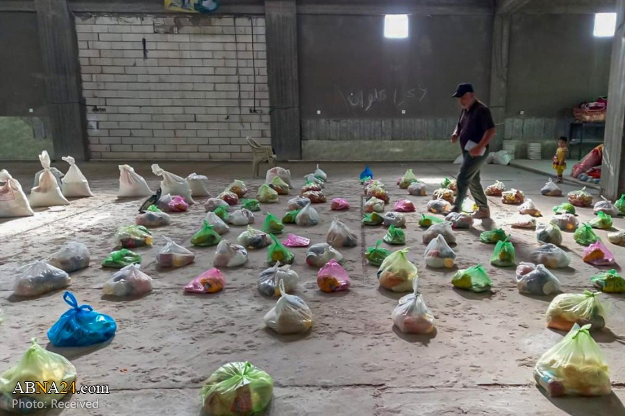 Relief, support processions of al-Abbas shrine recall birth of Prophet Muhammad through supporting needy families 