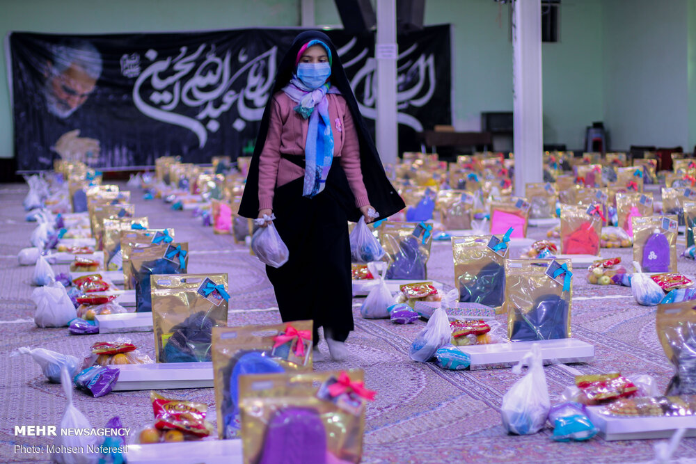 Photos: Preparing Yalda over 360 packages for needy in South Khorasan