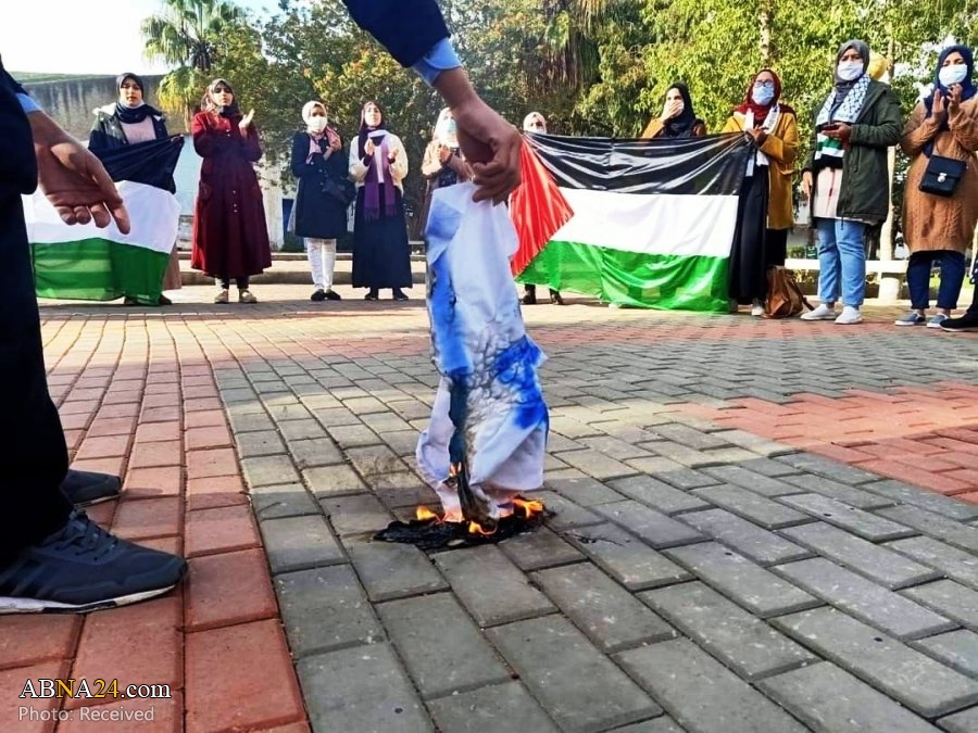 Photos: Moroccan students burn Israel flag in condemnation of normalization deal