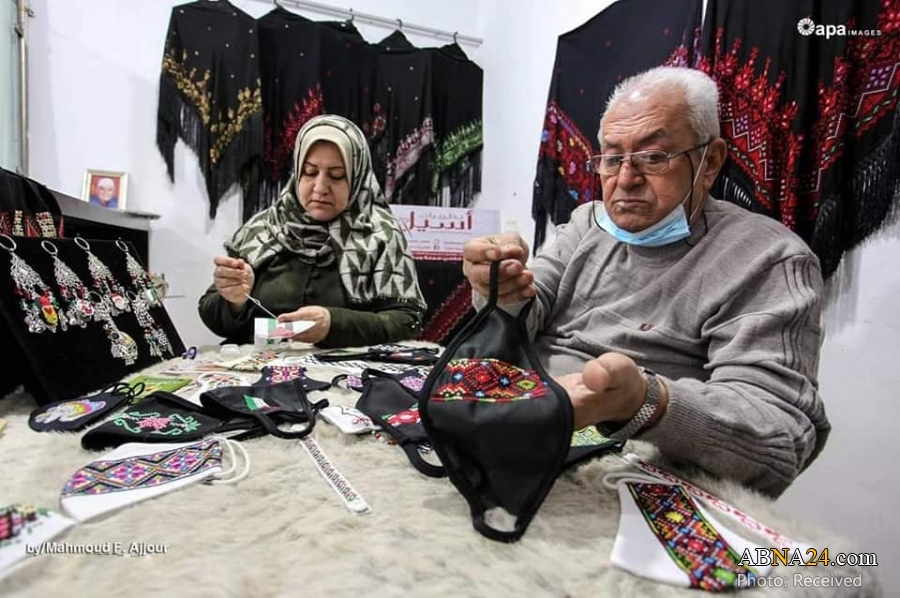Photos: Palestinian family making embroidered face masks with traditional Palestinian identity in Gaza