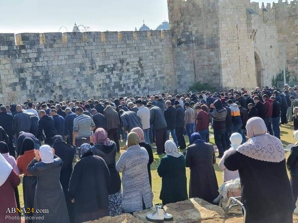 Photos: Palestinian worshipers perform Friday prayer outside historical gates of occupied Al-Quds
