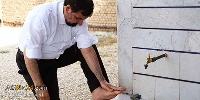 Why do Shi'ite Muslims wipe their feet rather than washing them in Wudhu?