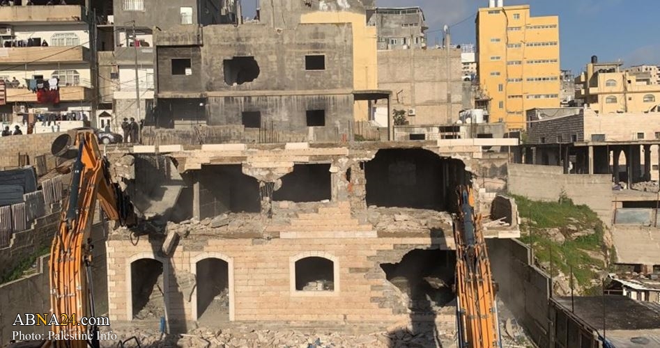 Israeli occupation authority razes Palestinian house, buildings in east al-Quds