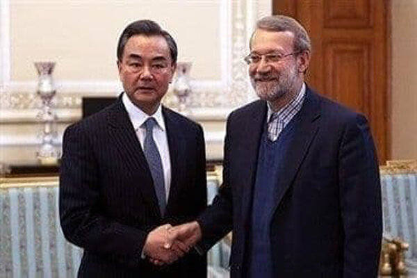 China FM meets with Iranian ex-speaker Larijani