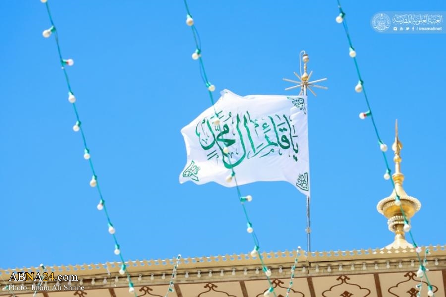 Banner of 'Ya Qaim Aal E Muhammad' raised above Imam Ali holy shrine on occasion of Imam Al Mahdi birthday