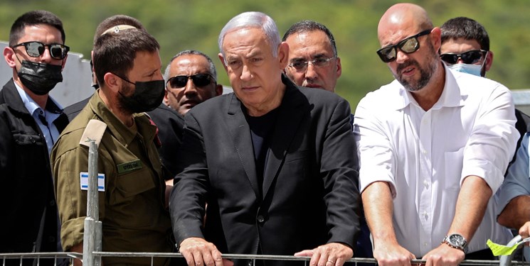 Israeli PM booed by bereaved protesters at stampede site