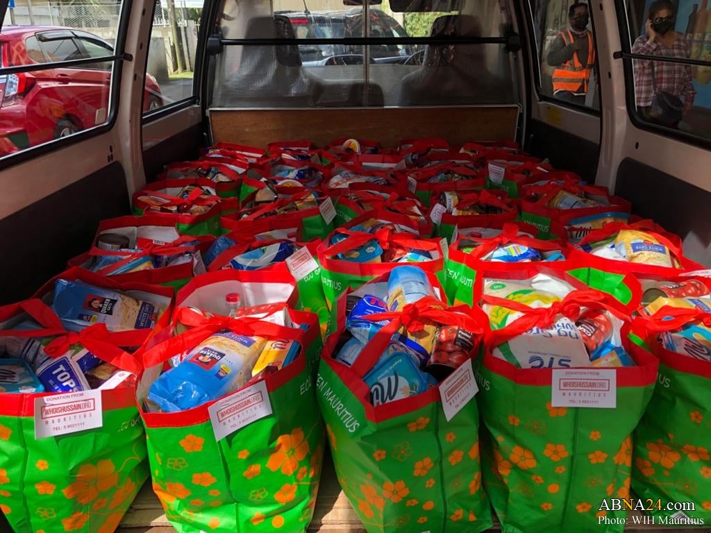 Photos: "Who is Hussain?" team help 25 families most affected by recent heavy rains in Mauritius island 