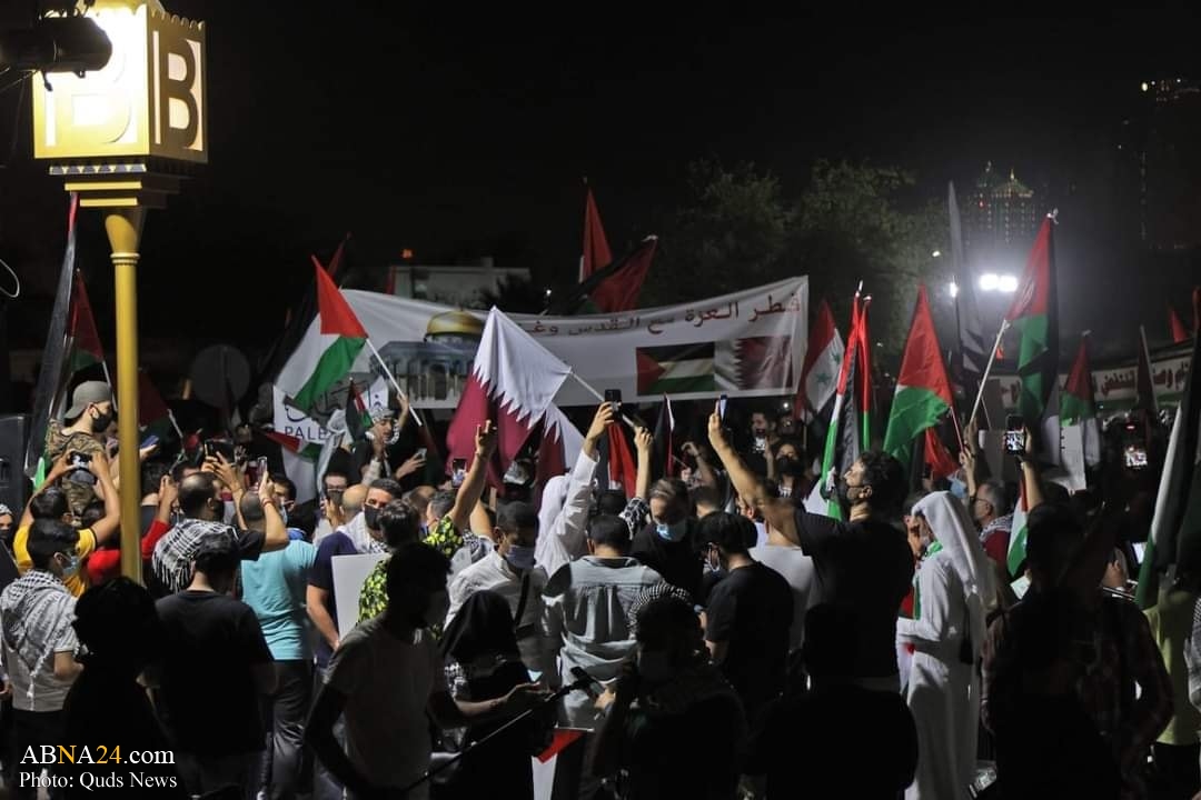 Des milliers de personnes sont descendues dans la rue à Doha, au Qatar, pour soutenir la Palestine et pour protester contre l'agression israélienne sur Gaza et al-Qods (Jérusalem), samedi 15 mai 2021.