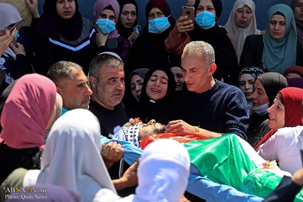 تقرير مصور / تشييع جثمان شهيد فلسطيني في الضفة الغربية