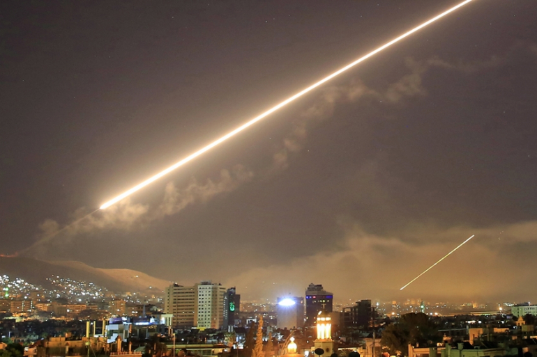 Syria’s air defenses intercept Israeli missiles over Damascus