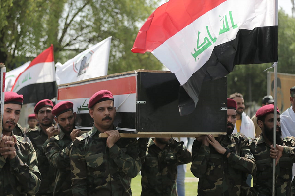 Funeral held for Iraqi PMU forces martyred in US airstrikes