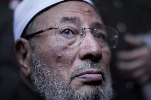 يوسف القرضاوي الذي وصف ثورة البحرين بـ «الطائفية» على قائمة الإرهاب الحكومية