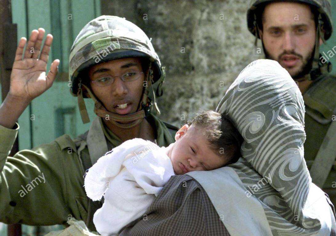 Israeli occupation forces arrest woman and her son, others in West Bank