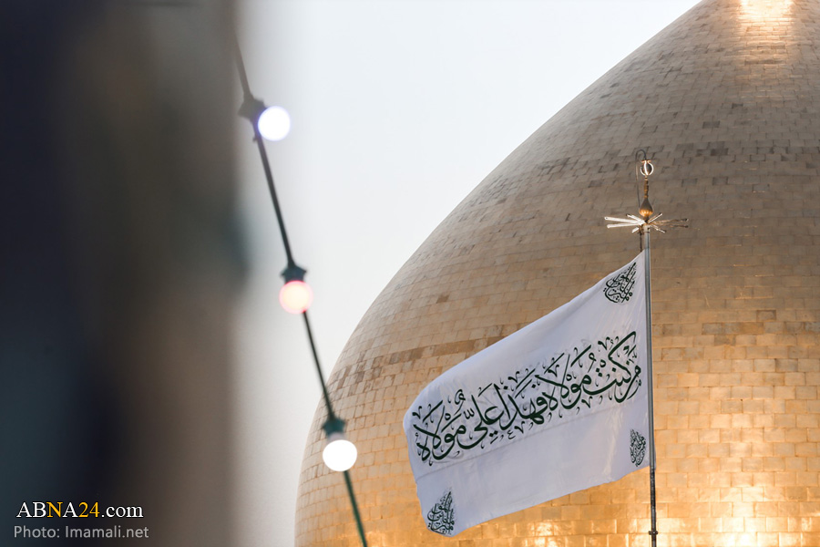 تصویری رپورٹ/ پرچم غدیر حرم امیر المومنین(ع) پر نصب کر دیا