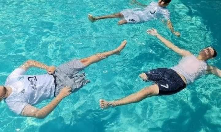 Photos: Disabled Palestinian children in Gaza swim during summer camp