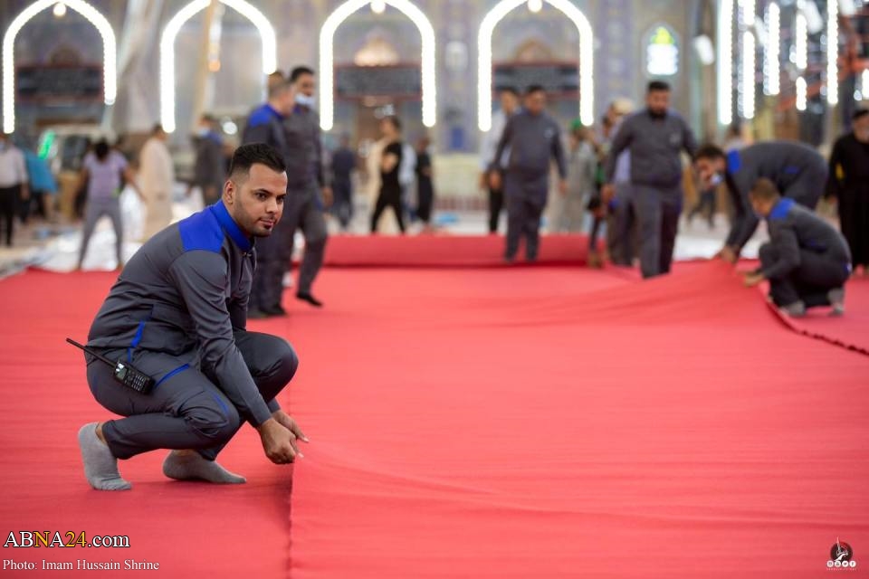 Photos: Imam Hussein shrine covered with red carpet in preparation for month of sorrow 'Muharram'