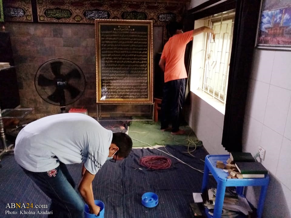 Photos: Cleaning and installing black banners at Panjatani Hussainiyah of Khulna, Bangladesh for Muharram 1443