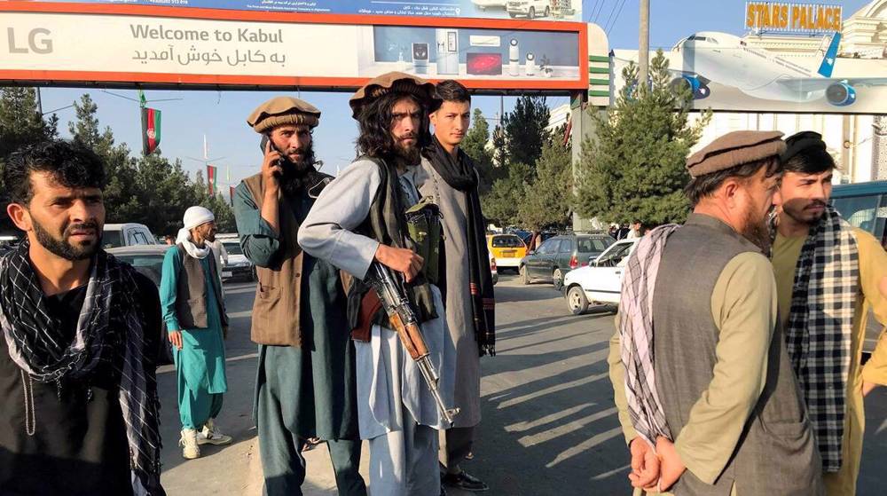 Chaos and killings at Kabul airport: US forces open fire as Afghans mob tarmac 