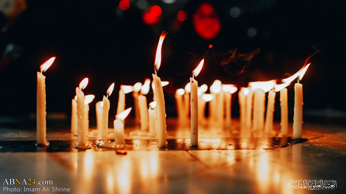 تقارير مصورة / إشعال شموع ليلة الوحشة عند حرم امير المؤمنين (ع) في النجف الأشرف