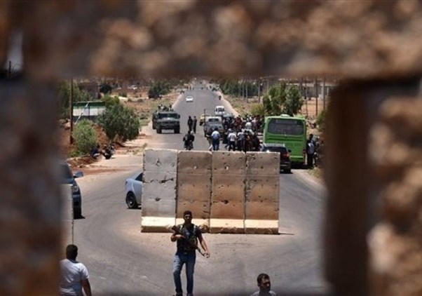 خروج 45 مسلحاً مع أفرادٍ من عائلاتهم من درعا نحو الشمال السوري