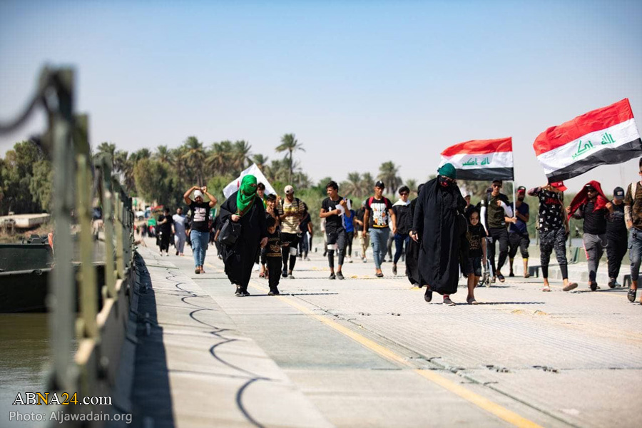 تقرير مصور/ زوار أربعينية الإمام الحسين (ع) يواصلون سيرهم على الأقدام نحو كربلاء المقدسة