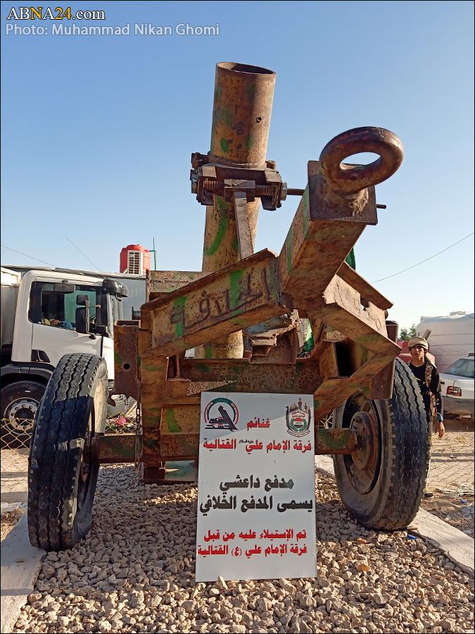 تقرير مصور/ موكب ومعرض غنائم داعش التي استولى عليها الحشد الشعبي في طريق زوار الأربعين