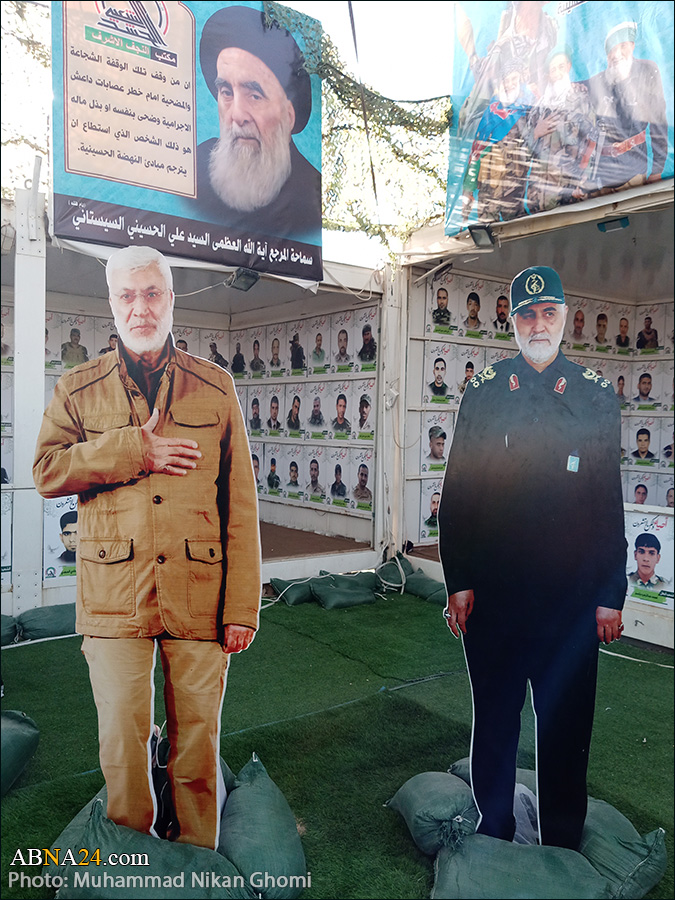 تقرير مصور/ معرض صور شهداء الحشد الشعبي في طريق زوار أربعينية الإمام الحسين (ع)
