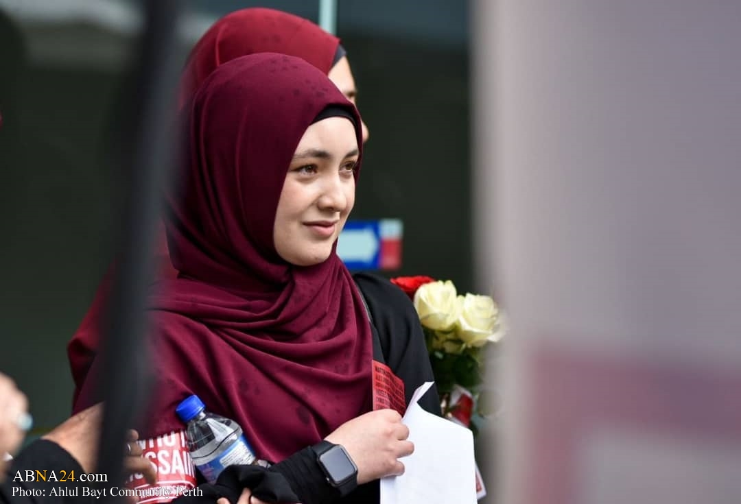 Photos: 'Who is Hussain?' volunteers in Perth, Australia give roses, water bottles to passersby in the name of Imam al-Hussain