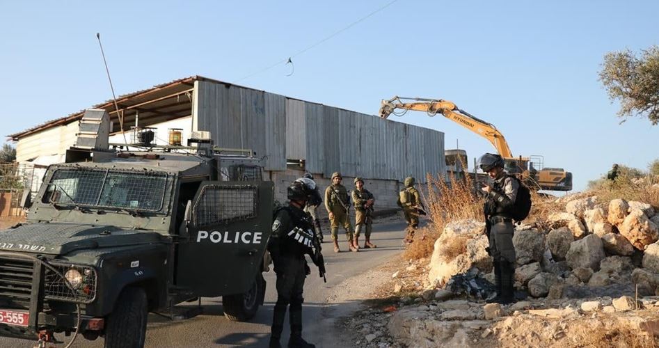 Israeli occupation army razes four Palestinian stores in western Ramallah