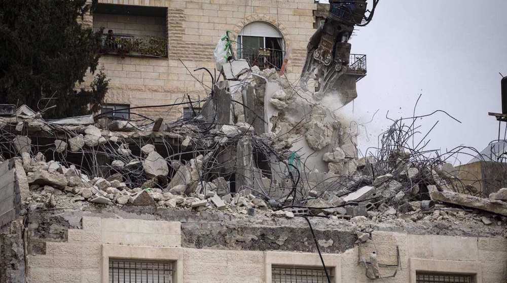 Israeli forces raze 3 Palestinian shops in West Bank